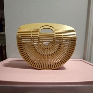 Yellow bamboo handbag